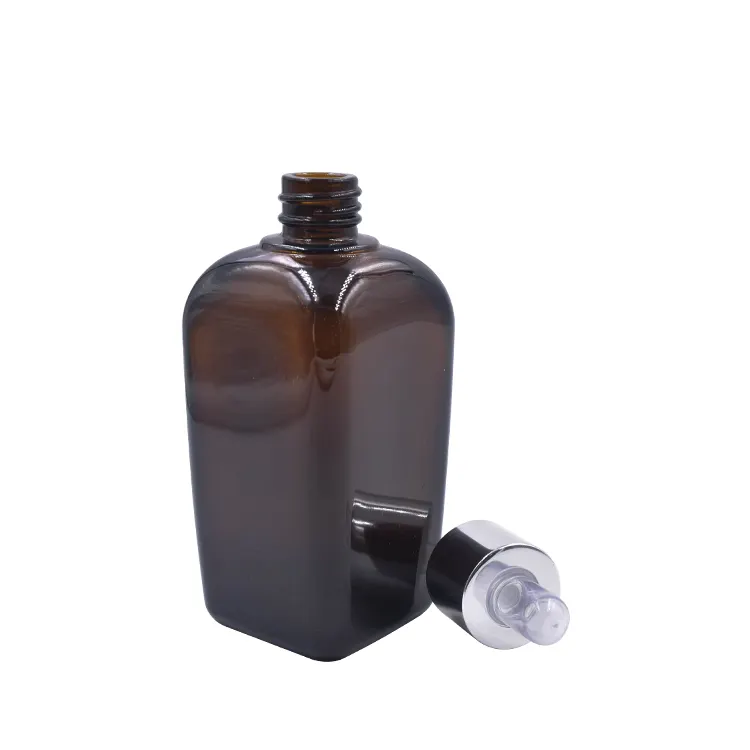 琥珀色のエッセンシャルオイルガラスボトル卸売化粧品スキンケアセット包装ガラスボトルシルバードロッパー付き