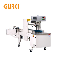 Machine d'étiquetage et de scellage de cartons entièrement automatique électrique GURKI GPETB3530-A pour l'emballage des boissons