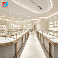 Comptoir d'exposition de bijoux LED doré, vitrine murale pour bijouterie de luxe, magasin de diamants