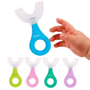 Cepillo de dientes de bebé en forma de U de silicona líquida de grado alimenticio libre de BPA para el cuidado bucal de niños pequeños de color personalizado con cabezal de cepillo reemplazable