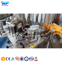 Étiqueteuse automatique d'impression adhésive thermofusible d'eau minérale de bouteille ronde d'animal familier