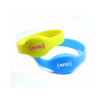 Bracelets RFID ovales en silicone écologique imperméable 13,56 MHz HF, bracelet fixe pour poignet, diamètre 60 mm 65 mm, pour station balnéaire, station de spa