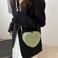 Sac à bandoulière en forme de cœur tendance, couleur bonbon, petit sac à bandoulière pour fille, sac à bandoulière décontracté en cuir PU avec fermeture éclair pour femme