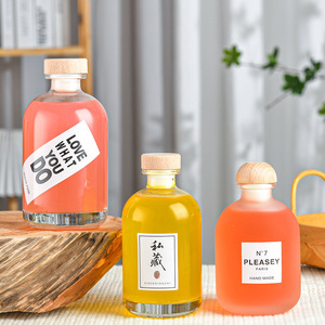 Flacon en verre dépoli rond haut de gamme de 500 ml avec couvercle pivotant, personnalisable avec logo pour boissons alcoolisées, sérigraphie - Product Image 3