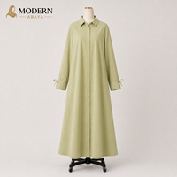 Robe longue vert clair modeste pour femme, à manches longues, boutonnée sur le devant, coupe trapèze avec poches latérales, fournisseur OEM