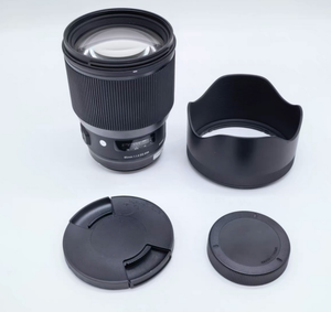Objectif 85mm f/1.4 DG HSM Art EF d'occasion à vendre — entièrement fonctionnel, aucun problème caché, pare-soleil inclus, prêt à l'emploi ! - Product Image 1