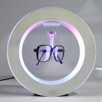 2024 vendeur chaud blanc flottant lévitation magnétique rotatif lévitation lunettes flottation stand lunettes affichage