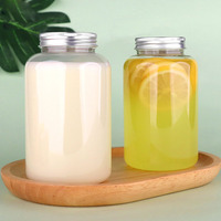 Vente en gros Bouteilles de boisson de jus transparentes rondes PET jetables de 500ml Bouteille d'eau vide en plastique transparent avec couvercle pour lait