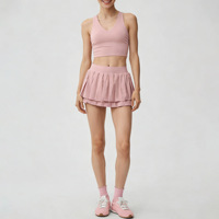 Ensemble de sport pour femme de créateur, couleur unie, avec jupe de tennis et soutien-gorge de sport, séchage rapide, sensation seconde peau, anti-transparence, coupe ajustée, col en V, résistant aux plis