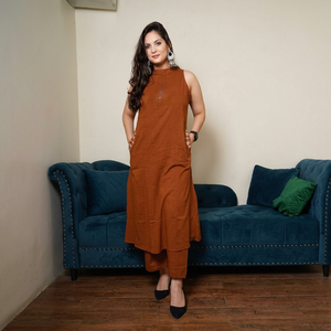 Rust Orange Sleeveless <b>Kurta</b> Set for <b>Women</b> with Embroidered Details Straight Pants Side Pockets and Elegant Ethnic Festive Style - Product Image 1