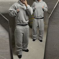 Ensemble survêtement homme personnalisé gris oversize avec sweat à capuche et pantalon de jogging 2 pièces en polyester respirant pour le streetwear décontracté et les loisirs