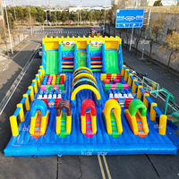Parc gonflable écologique commercial avec toboggan combiné et château sauteur, capacité de 1000 kg pour 25 enfants, parc d'attractions extérieur