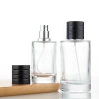 Vente en gros de flacons de parfum vides de luxe, 50 ml, 100 ml, flacon de parfum rond en verre transparent de haute qualité avec bouchon