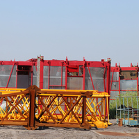 Élévateur à double cage SC200/200 pour la construction, fonctionnement à 2 mains, moteur 11-15 kW, tension 220 V/380 V, capacité 2000 kg, haute performance