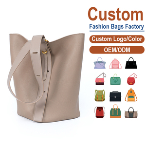 กระเป๋าหนังวัวแท้ชั้นบนสุดทรงถัง สีแอพริคอต หรูหรา พรีเมียม ความจุเยอะ  กระเป๋าสะพายไหล่แบบไขว้  รับผลิตตามแบบ OEM - Product Image 1