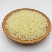 Colle thermofusible EVA de haute qualité, granulée jaune clair, pour la construction, l'emballage et la fermeture de cartons