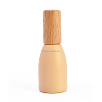 Nouveau flacon en verre épais vert et orange de 10 ml, sérigraphié, à faible MOQ, avec couvercle en bois de hêtre