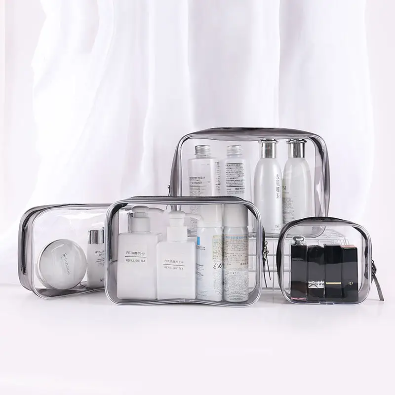 Sacchetti di organizzatore di trucco trasparenti portatili di vendita caldi 4 pezzi Set Tote articoli da toeletta da viaggio borsa cosmetica in PVC trasparente