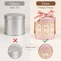 Boîte cadeau cylindrique rose exquise, fabriquée en carton rond luxueux, accompagnée d'un ruban pour la décoration.