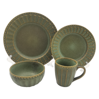 Service de table rustique vintage en céramique verte, assiettes, bols et tasses en grès strié et moucheté avec bordure perlée, vaisselle de ferme