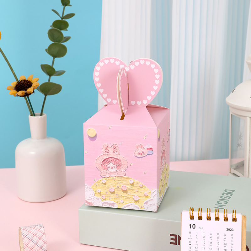 Coniglio luna guardando [scatola di mele]