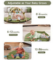 Tapis de jeu pour bébé moderne en coton doux vert à fleurs 2 en 1 avec jouets suspendus et jouet en peluche écureuil pour une utilisation à la maison