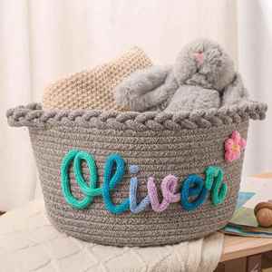 Panier de rangement rond pliable en coton tissé pour jouets, idéal pour la salle de bain, la chambre d'enfant, les bébés garçons et filles, et les baby showers. - Product Image 1