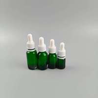 Fournisseur en gros de flacons d'huile essentielle en verre bleu de 5 ml, 10 ml, 15 ml, 20 ml, 30 ml, 50 ml, 100 ml avec bouchon en PP et compte-gouttes, conteneur cosmétique