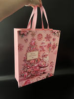 Bolsas de Regalo de Papel Navideñas en Stock con Impresión a Todo Color, Acabado Mate y Asas de Cuerda de Poliéster