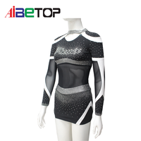 Uniforme de cheerleading de luxe noir et argenté avec strass |   Tenue de performance avec panneau en maille transparente et dos croisé