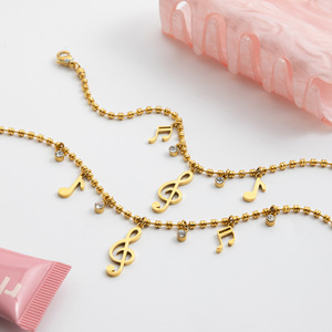 Conjunto de joyería chapado en oro de 18 quilates de acero inoxidable, conjunto de collar y pulsera con notas musicales para mujer - Product Image 4