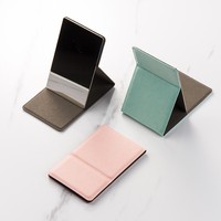 Groothandel Hand Gehouden Cosmetische Roestvrij Staal Leer Draagbare Pocket Spiegel Opvouwbaar Met Warmte Lassen Afwerking