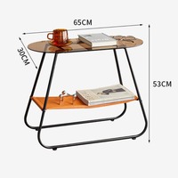 Table basse ovale moderne et durable à double plateau en verre avec structure métallique, design étroit et rangement ouvert pour salon et chambre à coucher