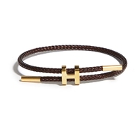Bracelet élastique en acier titane plaqué or avec boucle en forme de H réglable pour femmes