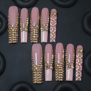 Prix d'usine, vente en gros : Faux ongles à presser faits main, couvrance totale, forme bec de canard long, en acrylique de luxe, motif étoile et papillon - Product Image 1