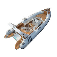 Bateau pneumatique rigide en fibre de verre de 7 m pour la pêche sportive, moteur hors-bord, télécommande, fabriqué en Chine, pour utilisation comme bateau d'appoint pour yacht ou annexe.