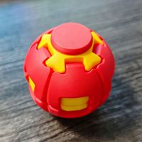 Balle de décompression promotionnelle en plastique à pression et rotation avec rebond lent pour puzzle d'enfants - Nouveau jouet unique