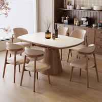 Table à manger moderne pliable et extensible en pierre frittée avec pieds en bois et 8 chaises pour usage domestique