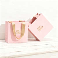 Sacs en papier de luxe blancs personnalisés avec logo pour boutiques de détail et cadeaux, fabriqués en Chine, vente en gros