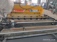 Machine de découpe de tôles en acier coupe de niveau cisaillement panneau de toiture tuile émaillée rouleau de toiture machine de découpe