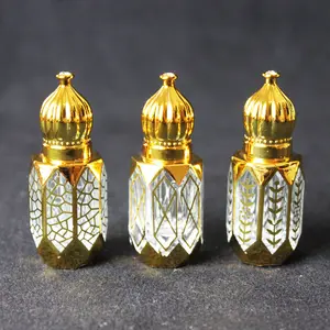 Wholesale 3ml dubai roll on gold pattern stamping perfume or essential oil sample glass bottle for sale