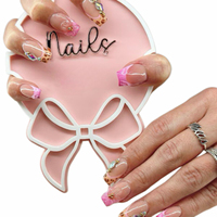 Présentoir à ongles en acrylique avec bordure dorée et nœud papillon, multicolore, pour manucure, accessoire photo pour selfies, support de prise de vue pour nail art, pour usage en salon de manucure
