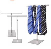 Support de présentoir rotatif pour porte-clés en métal doré poli en forme de T