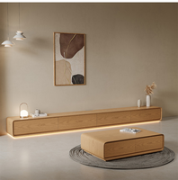 Nouveau design 2026 : Meuble TV mural et table basse en frêne pour salon moderne, compatible avec les téléviseurs de 65 pouces et plus.