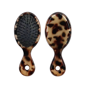 2023 Hot Sale Leoparden muster Gummi kissen Entwirrungs bürste Effektive Haarkamm Detang ler Haar bürste für Frauen - Product Image 1