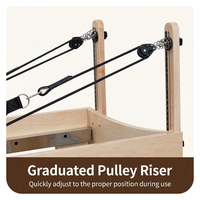 Lit de Pilates Reformer en bois avec ressorts pour entraînement de résistance, idéal pour studio et fitness à domicile