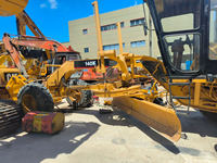 Niveleuse d'occasion Marque CAT 140K Japon en bon état Niveleuse CAT 140k niveleuse sur pneus Caterpillar d'occasion à vendre en stock
