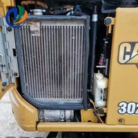 Vente flash : Mini-excavatrice sur chenilles CAT 302 d'occasion, compacte et hydraulique, idéale pour les chantiers étroits