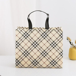 Bolsas de Compras de Tela No Tejida con Logotipo Personalizado, Estilo Moderno para Tiendas de Ropa Transfronterizas - Product Image 2