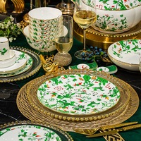 Nouvel ensemble de vaisselle en porcelaine osseuse de grande valeur Nouveaux bols, assiettes et plats ménagers de luxe légers de style chinois Cadeaux haut de gamme